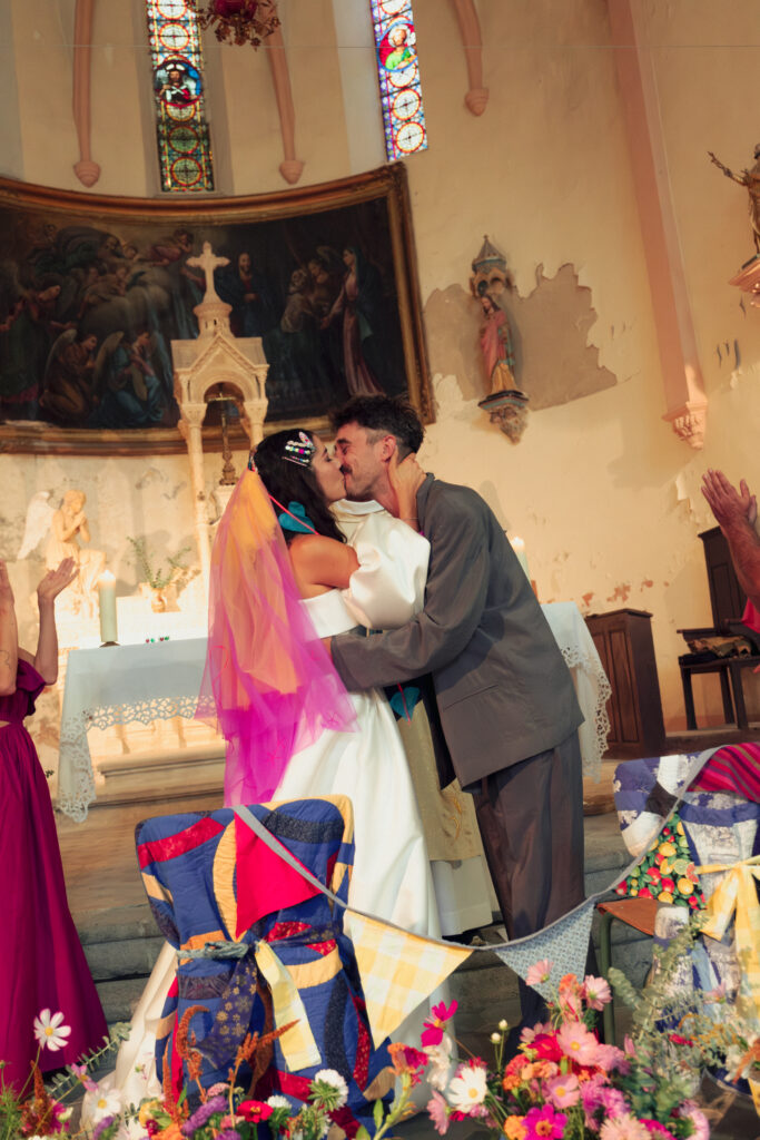 Kiss in front of the altar - Europe wedding photographers